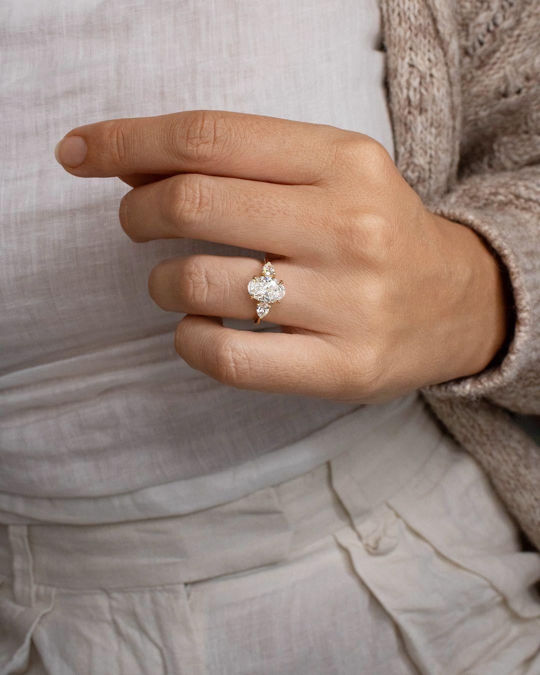 Lab Grown Oval Diamond Trilogy Ring: 14k Gold Pear Side Stones