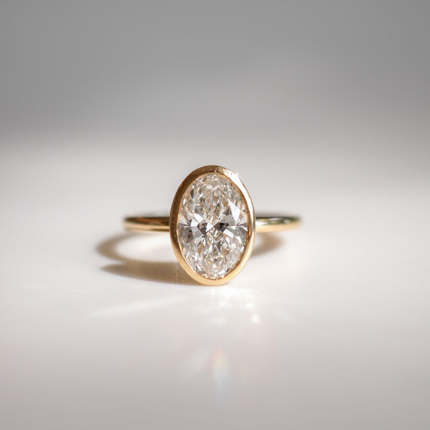 3Ct Oval Lab Grown Diamond Engagement Ring: Bezel Setting, IGI Certified