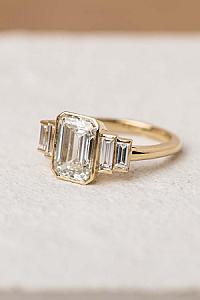 Vintage Emerald Cut Moissanite Five Stone Ring: 14K White Gold Bezel Set - Image 1