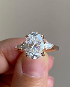 Oval Moissanite Engagement Ring: Three Stone Pear Side Stones, 2 Carat - Image 4