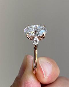 Oval Moissanite Engagement Ring: Three Stone Pear Side Stones, 2 Carat - Image 3