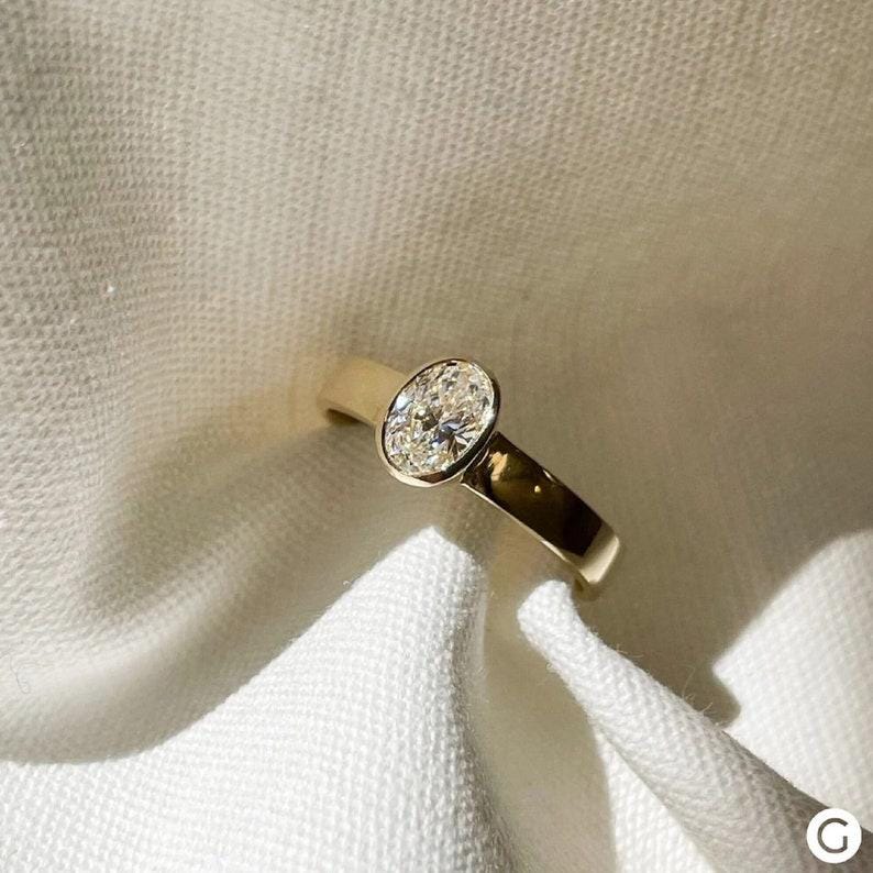 1.00 Carat Oval Lab Grown Diamond Engagement Ring, 14k Yellow Gold Bezel Solitaire